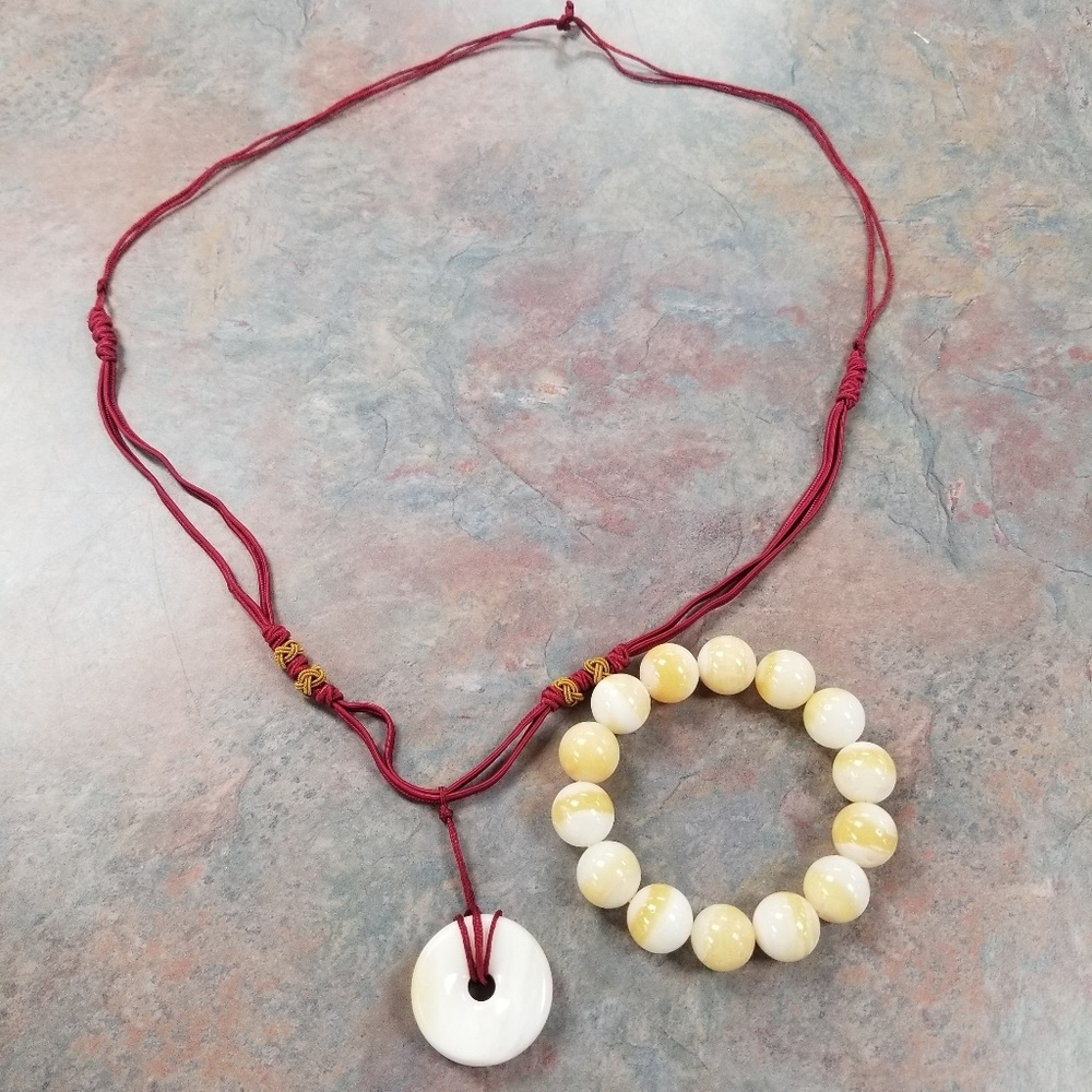 Hand carved golden tridacna bracelet and pendant